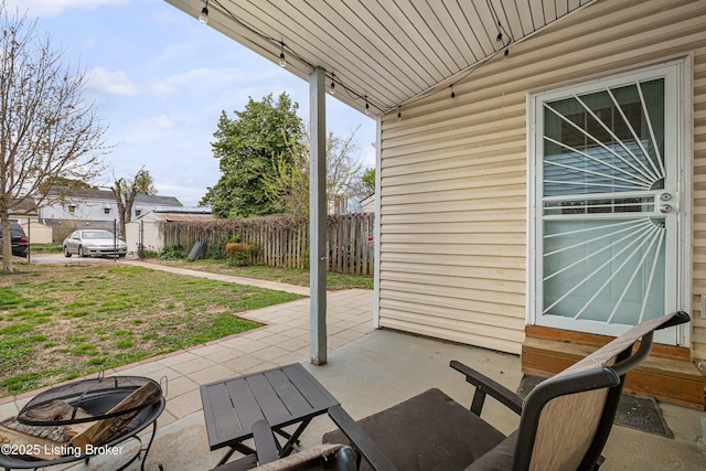 920 Lydia St, Louisville, KY 40217 - view of patio / terrace with entry steps and a storage shed
