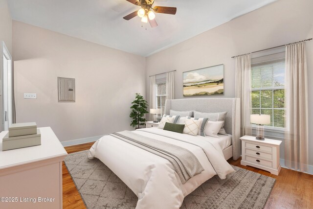 920 Lydia St, Louisville, KY 40217 - bedroom with light wood-style flooring and a ceiling fan
