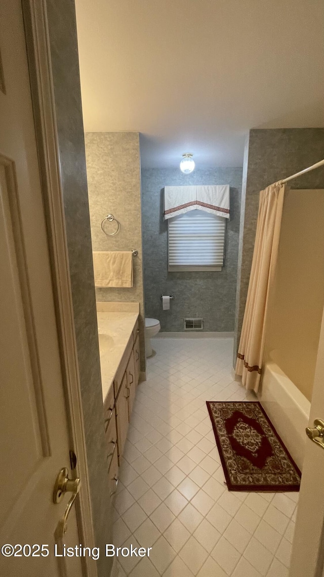 123 Westwind Trl, Bardstown, KY 40004 - full bathroom featuring tile patterned floors, vanity, toilet, and shower / bathtub combination with curtain