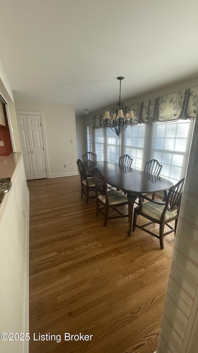123 Westwind Trl, Bardstown, KY 40004 - dining room with wood finished floors, a chandelier, and baseboards