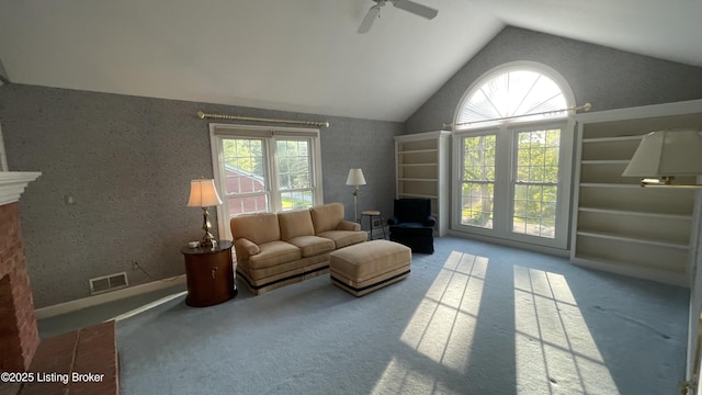 123 Westwind Trl, Bardstown, KY 40004 - carpeted living area featuring a fireplace, vaulted ceiling, and ceiling fan