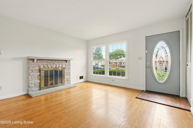 2806 Girard Dr, Louisville, KY 40213 - foyer entrance featuring hardwood / wood-style floors, baseboards, and a fireplace