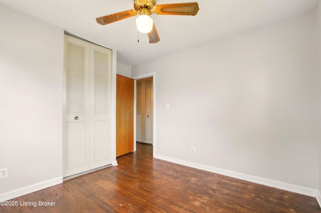2806 Girard Dr, Louisville, KY 40213 - unfurnished bedroom with baseboards, a closet, wood finished floors, and ceiling fan