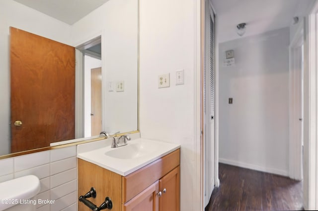2806 Girard Dr, Louisville, KY 40213 - bathroom with vanity, wood finished floors, and toilet