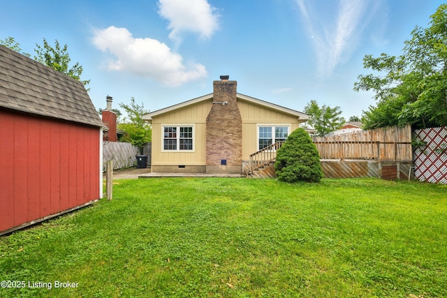 2806 Girard Dr, Louisville, KY 40213 - back of property with a chimney and crawl space
