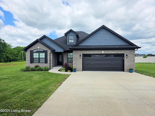 202 Elizabeth Way, Bardstown, KY 40004 - view of front of home featuring a garage, driveway, brick siding, and a front yard