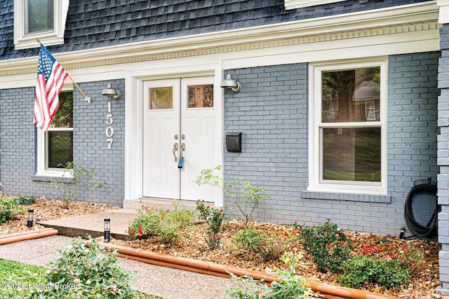1507 Glenrock Rd, Louisville, KY 40216 - entrance to property with brick siding, a shingled roof, and mansard roof