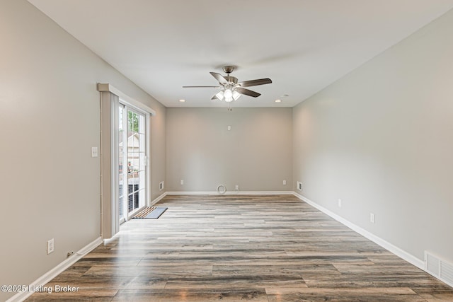 1507 Glenrock Rd, Louisville, KY 40216 - unfurnished room featuring a ceiling fan, wood finished floors, and baseboards