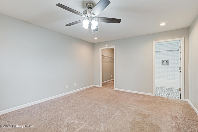 1507 Glenrock Rd, Louisville, KY 40216 - unfurnished bedroom with light carpet, baseboards, a spacious closet, recessed lighting, and connected bathroom