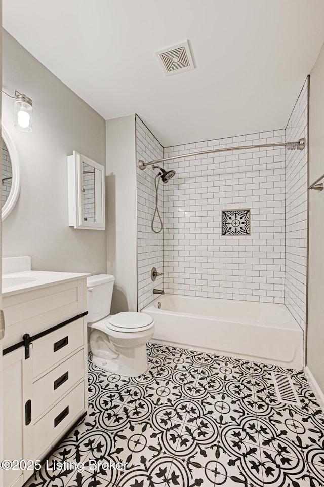 1507 Glenrock Rd, Louisville, KY 40216 - bathroom with toilet, vanity, shower / tub combination, and tile patterned floors