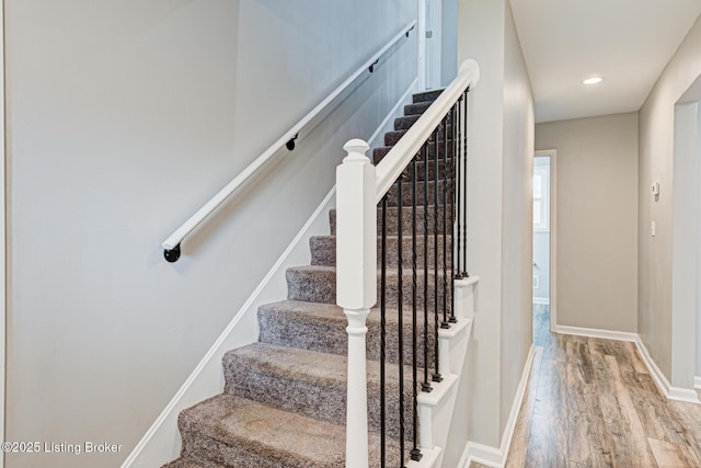 1507 Glenrock Rd, Louisville, KY 40216 - stairs with wood finished floors, baseboards, and recessed lighting