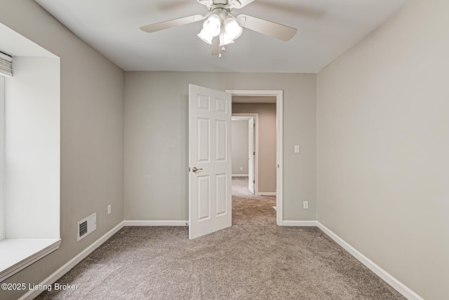 1507 Glenrock Rd, Louisville, KY 40216 - carpeted spare room with ceiling fan and baseboards