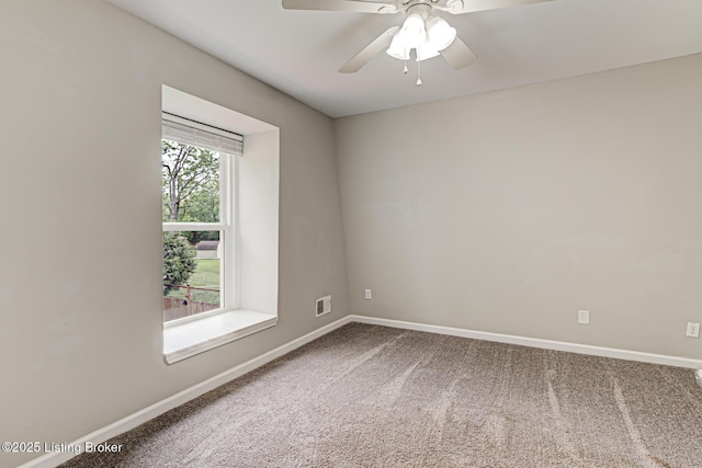 1507 Glenrock Rd, Louisville, KY 40216 - unfurnished room with carpet floors, baseboards, and ceiling fan