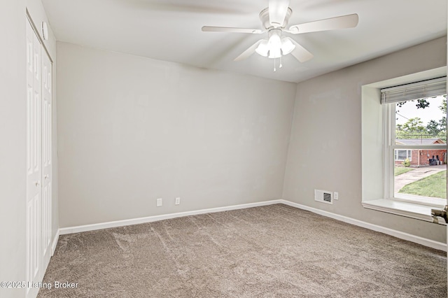 1507 Glenrock Rd, Louisville, KY 40216 - unfurnished bedroom with carpet flooring, a closet, baseboards, and ceiling fan