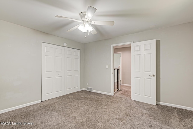 1507 Glenrock Rd, Louisville, KY 40216 - unfurnished bedroom featuring carpet flooring, a closet, ceiling fan, and baseboards