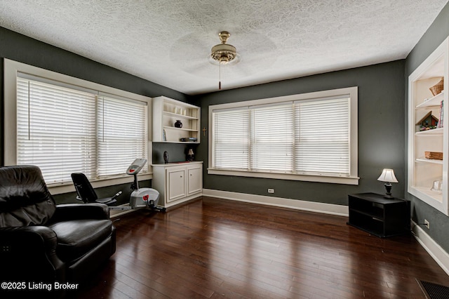 916 Audubon Pkwy, Audubon Park, KY 40213 - office area with dark wood-style floors, a textured ceiling, and baseboards