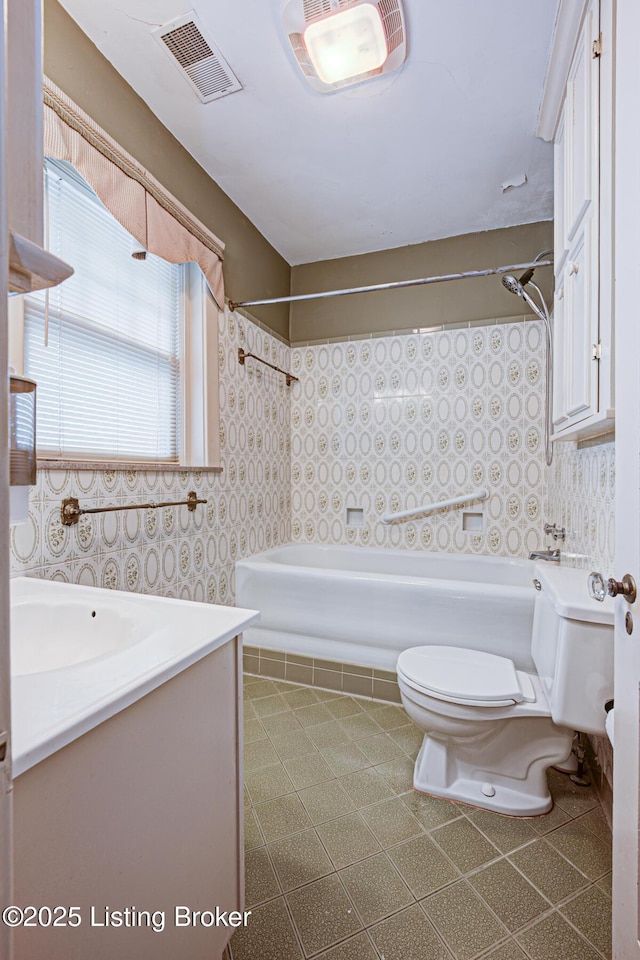 916 Audubon Pkwy, Audubon Park, KY 40213 - bathroom with toilet, shower / tub combination, and vanity