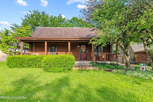 3804 Grassy Creek Dr, Lexington, KY 40503 - cabin with log exterior, covered porch, and a front yard