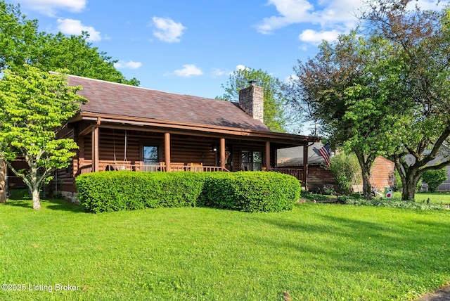 3804 Grassy Creek Dr, Lexington, KY 40503 - back of house with a lawn, a chimney, log exterior, and roof with shingles