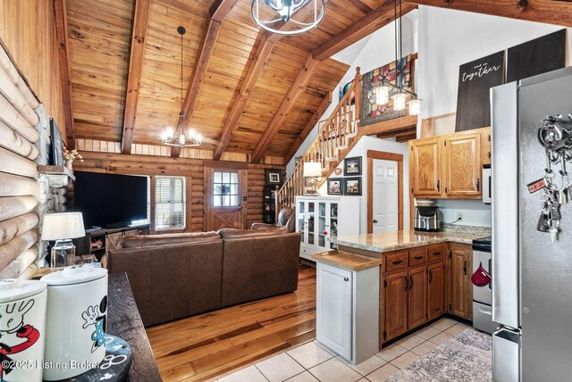 3804 Grassy Creek Dr, Lexington, KY 40503 - kitchen featuring freestanding refrigerator, wooden ceiling with exposed beams, a peninsula, open floor plan, and light tile patterned flooring
