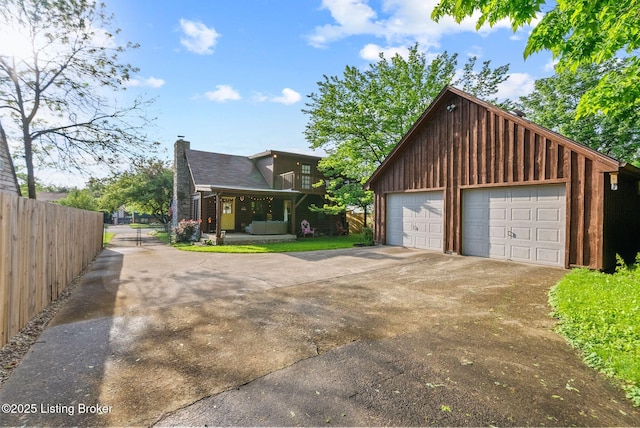 3804 Grassy Creek Dr, Lexington, KY 40503 - view of front of property featuring a chimney, a detached garage, and an outbuilding
