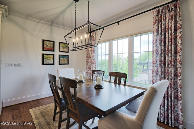 5201 Spring Mist Ct, Prospect, KY 40059 - dining area with crown molding, plenty of natural light, wood finished floors, a chandelier, and baseboards