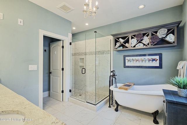 5201 Spring Mist Ct, Prospect, KY 40059 - bathroom with marble finish floors, a soaking tub, a shower stall, a chandelier, and recessed lighting