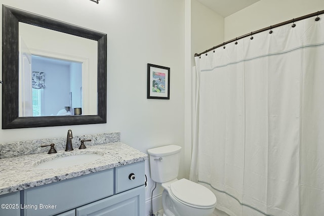 5201 Spring Mist Ct, Prospect, KY 40059 - bathroom with toilet, vanity, and a shower with shower curtain