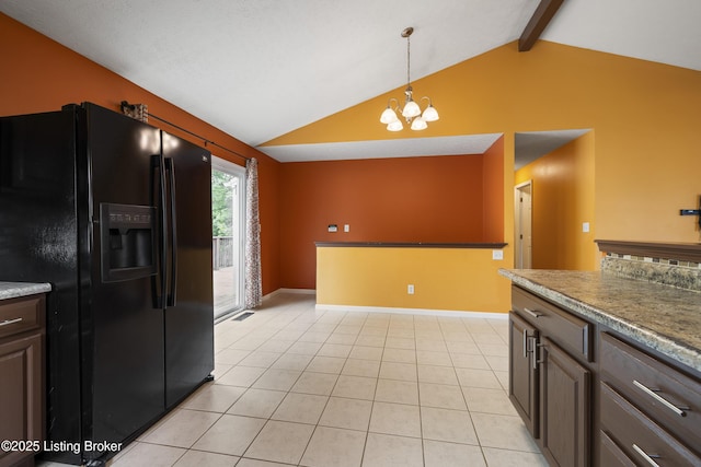 6821 James Madison Way, Louisville, KY 40272 - kitchen featuring black fridge with ice dispenser, a chandelier, decorative light fixtures, light tile patterned floors, and baseboards