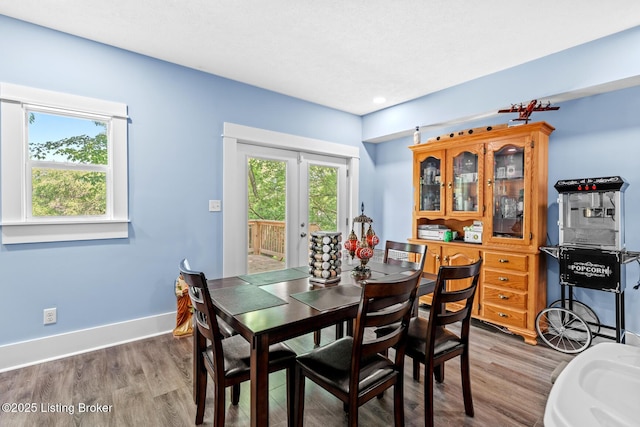 3106 Ramser Ave, Louisville, KY 40216 - dining room with wood finished floors and baseboards