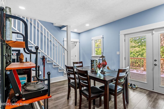 3106 Ramser Ave, Louisville, KY 40216 - dining area with wood finished floors, a textured ceiling, french doors, stairway, and recessed lighting