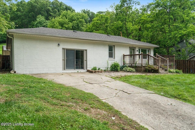 10711 Jefferson Hill Rd, Fairdale, KY 40118 - back of house with brick siding, a wooden deck, and a patio area