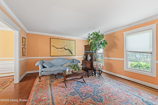 2309 Phoenix Hill Dr, Louisville, KY 40207 - living room with wood finished floors, ornamental molding, and baseboards