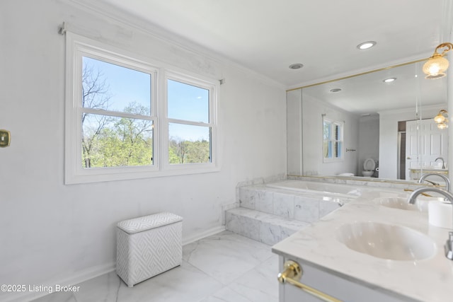 2309 Phoenix Hill Dr, Louisville, KY 40207 - bathroom with baseboards, a garden tub, ornamental molding, double vanity, and recessed lighting