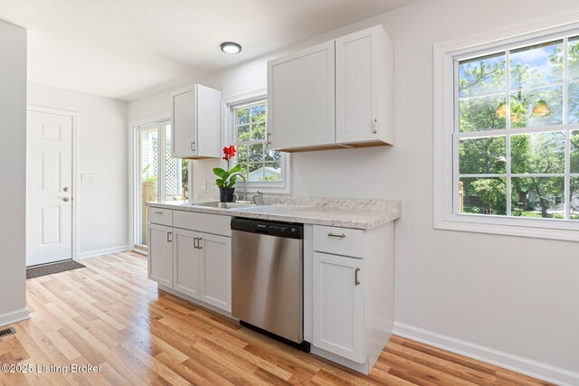 10518 Fairview Ave, Louisville, KY 40299 - kitchen featuring dishwasher, a sink, light countertops, and baseboards