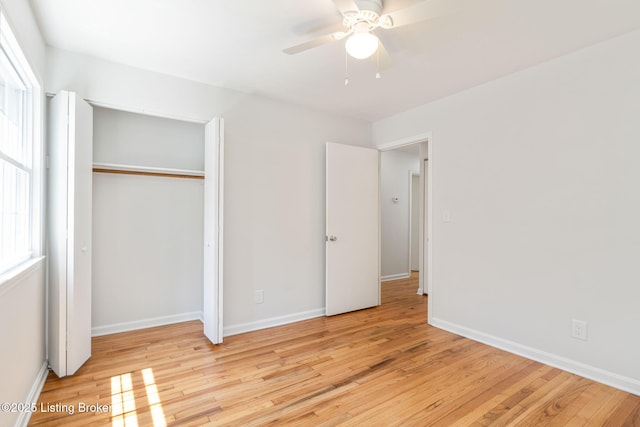 10518 Fairview Ave, Louisville, KY 40299 - unfurnished bedroom featuring light wood finished floors, baseboards, a closet, and a ceiling fan