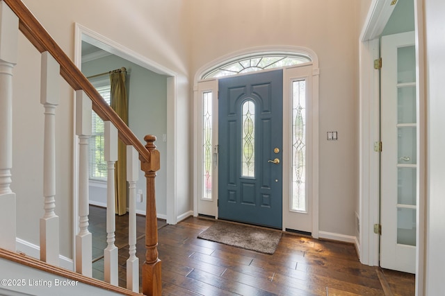 3613 Wynbrooke Cir, Louisville, KY 40241 - entrance foyer with stairway, healthy amount of natural light, dark wood finished floors, and baseboards