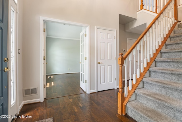 3613 Wynbrooke Cir, Louisville, KY 40241 - entrance foyer with wood-type flooring, baseboards, stairs, crown molding, and a towering ceiling