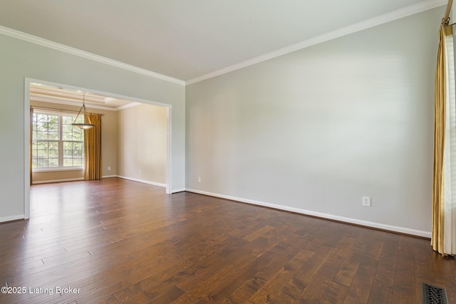 3613 Wynbrooke Cir, Louisville, KY 40241 - empty room featuring dark wood-style floors, baseboards, ornamental molding, and a chandelier