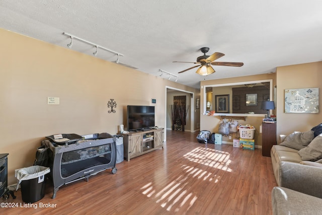 140 Ample Way, Shepherdsville, KY 40229 - living room featuring ceiling fan, wood finished floors, and rail lighting