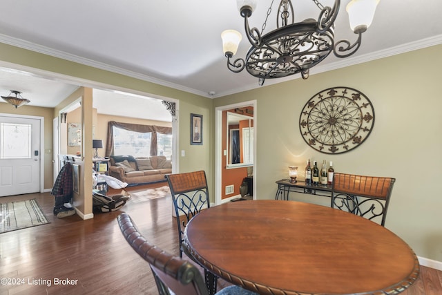 140 Ample Way, Shepherdsville, KY 40229 - dining room with a chandelier, baseboards, ornamental molding, and wood finished floors