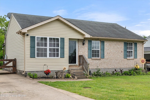 1300 Keane Ave, La Grange, KY 40031 - view of front of house featuring a front lawn, roof with shingles, brick siding, and entry steps