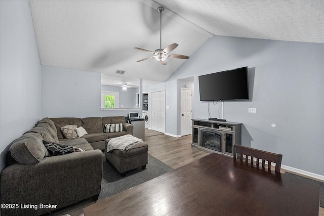 1300 Keane Ave, La Grange, KY 40031 - living area featuring a ceiling fan, lofted ceiling, wood finished floors, baseboards, and a textured ceiling