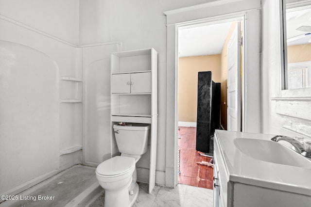 2028 S 16th St, Louisville, KY 40210 - full bath with vanity, toilet, marble look tile flooring, and a shower
