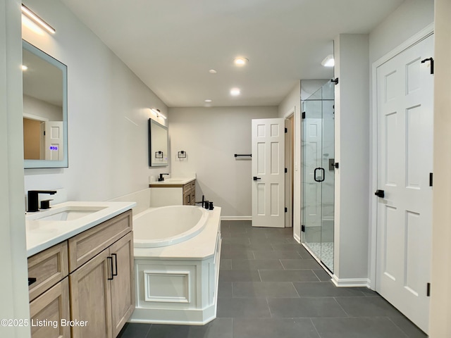 5101 Elm Tree Pl, Louisville, KY 40299 - bathroom with a shower stall, two vanities, a bath, baseboards, and tile patterned flooring