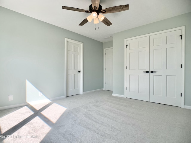 5101 Elm Tree Pl, Louisville, KY 40299 - unfurnished bedroom featuring light colored carpet, baseboards, a closet, and ceiling fan