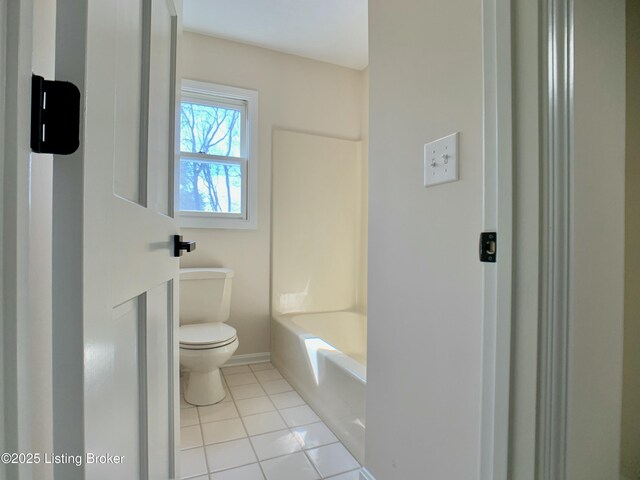 5101 Elm Tree Pl, Louisville, KY 40299 - bathroom with toilet, tile patterned flooring, a tub to relax in, baseboards, and a shower