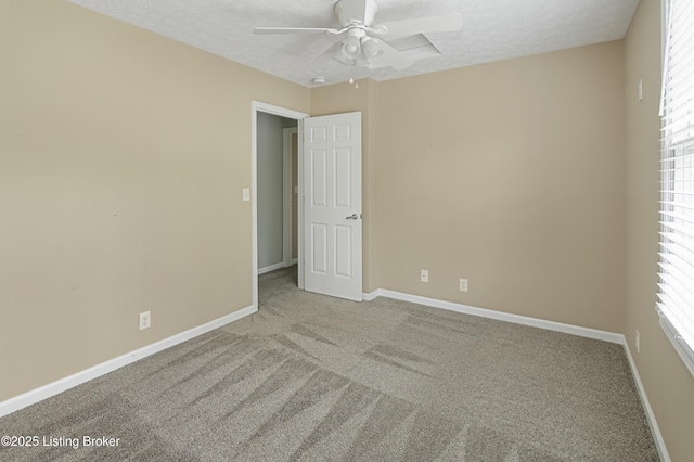 12308 Dominion Way, Louisville, KY 40299 - carpeted empty room with a textured ceiling, ceiling fan, and baseboards