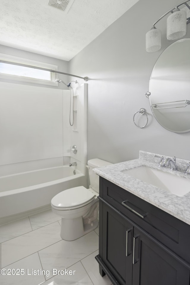 12308 Dominion Way, Louisville, KY 40299 - full bath with vanity, bathing tub / shower combination, toilet, a textured ceiling, and marble finish flooring