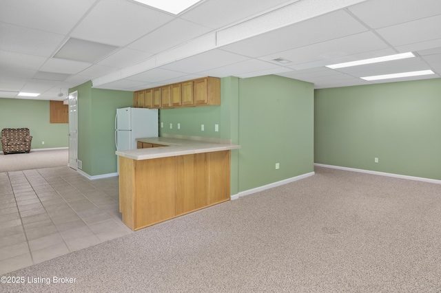 12308 Dominion Way, Louisville, KY 40299 - kitchen featuring freestanding refrigerator, light carpet, a paneled ceiling, open floor plan, and light countertops